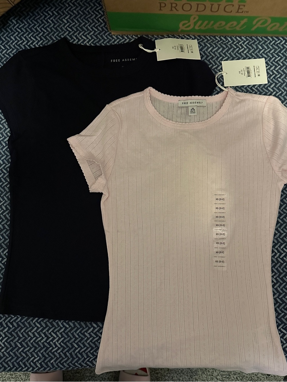 2 Piece set of t-shirts.  One Pointelle Pink and one navy cap sleeve.